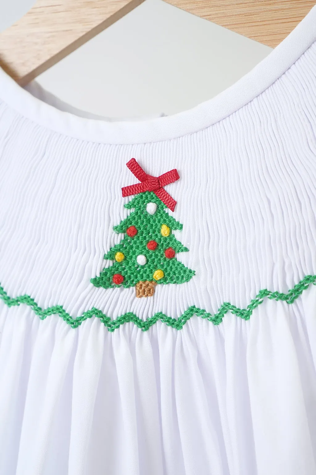 White chrismtas tree hand smocked girl romper